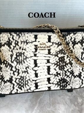 Coach “Nolita” Snake Embossed Wristlet Black, White